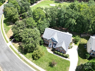 Situated on a coveted corner lot beside the 17th green in Olde on Olde Sycamore Golf Plantation in North Carolina - for sale on GolfHomes.com, golf home, golf lot