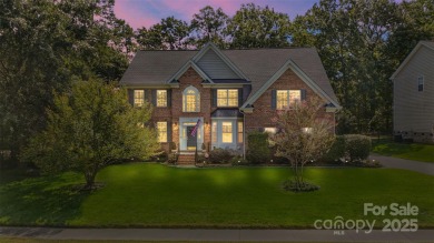 Situated on a coveted corner lot beside the 17th green in Olde on Olde Sycamore Golf Plantation in North Carolina - for sale on GolfHomes.com, golf home, golf lot