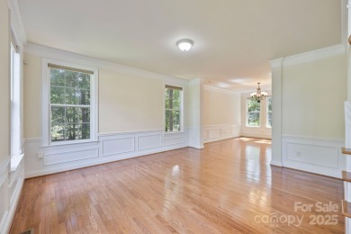 Situated on a coveted corner lot beside the 17th green in Olde on Olde Sycamore Golf Plantation in North Carolina - for sale on GolfHomes.com, golf home, golf lot