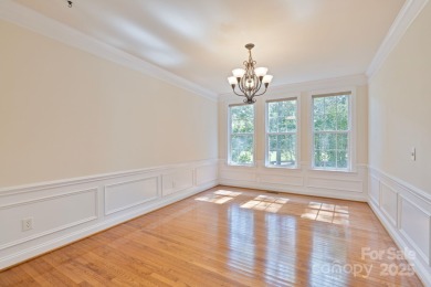 Situated on a coveted corner lot beside the 17th green in Olde on Olde Sycamore Golf Plantation in North Carolina - for sale on GolfHomes.com, golf home, golf lot