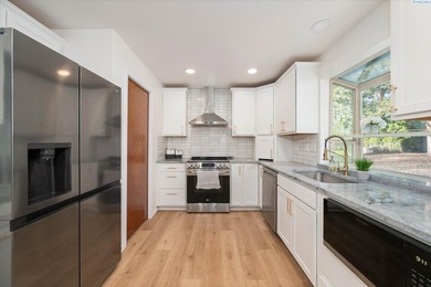 Updated Single-Level Living in a Highly Desirable Location Near on Meadow Springs Country Club in Washington - for sale on GolfHomes.com, golf home, golf lot