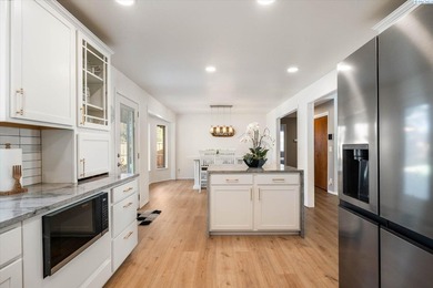 Updated Single-Level Living in a Highly Desirable Location Near on Meadow Springs Country Club in Washington - for sale on GolfHomes.com, golf home, golf lot