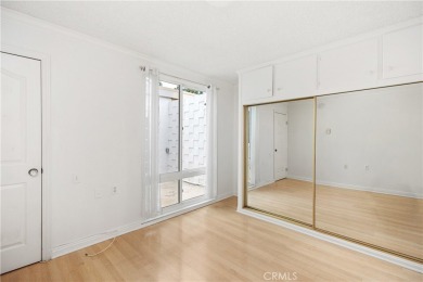 Sun-splashed Barcelona end unit with leafy outlooks, a private on Laguna Woods Village Golf Course in California - for sale on GolfHomes.com, golf home, golf lot