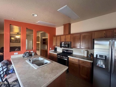 Beautiful well cared for home in White Mountain Lakes. Home come on Silver Creek Golf Club in Arizona - for sale on GolfHomes.com, golf home, golf lot