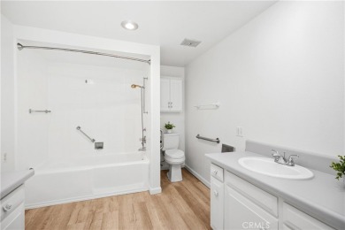 Sun-splashed Barcelona end unit with leafy outlooks, a private on Laguna Woods Village Golf Course in California - for sale on GolfHomes.com, golf home, golf lot