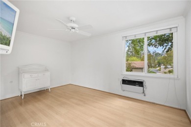 Sun-splashed Barcelona end unit with leafy outlooks, a private on Laguna Woods Village Golf Course in California - for sale on GolfHomes.com, golf home, golf lot