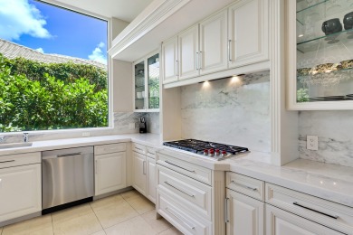 Beautifully renovated custom two story 5 bedroom estate situated on St. Andrews Country Club of Boca Raton in Florida - for sale on GolfHomes.com, golf home, golf lot