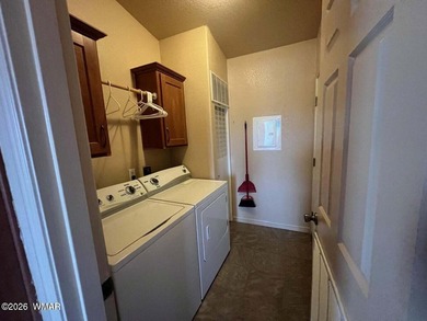 Beautiful well cared for home in White Mountain Lakes. Home come on Silver Creek Golf Club in Arizona - for sale on GolfHomes.com, golf home, golf lot