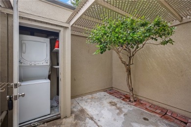 Sun-splashed Barcelona end unit with leafy outlooks, a private on Laguna Woods Village Golf Course in California - for sale on GolfHomes.com, golf home, golf lot