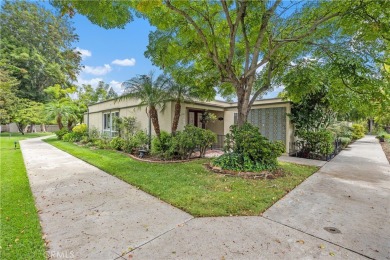 Sun-splashed Barcelona end unit with leafy outlooks, a private on Laguna Woods Village Golf Course in California - for sale on GolfHomes.com, golf home, golf lot