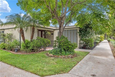 Sun-splashed Barcelona end unit with leafy outlooks, a private on Laguna Woods Village Golf Course in California - for sale on GolfHomes.com, golf home, golf lot