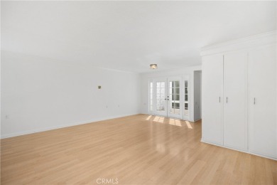 Sun-splashed Barcelona end unit with leafy outlooks, a private on Laguna Woods Village Golf Course in California - for sale on GolfHomes.com, golf home, golf lot