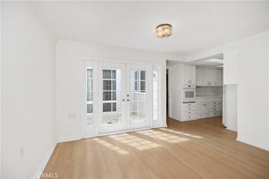 Sun-splashed Barcelona end unit with leafy outlooks, a private on Laguna Woods Village Golf Course in California - for sale on GolfHomes.com, golf home, golf lot