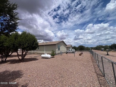 Beautiful well cared for home in White Mountain Lakes. Home come on Silver Creek Golf Club in Arizona - for sale on GolfHomes.com, golf home, golf lot