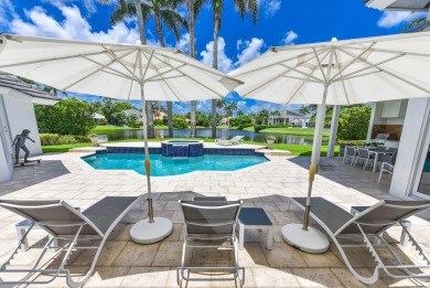 Beautifully renovated custom two story 5 bedroom estate situated on St. Andrews Country Club of Boca Raton in Florida - for sale on GolfHomes.com, golf home, golf lot