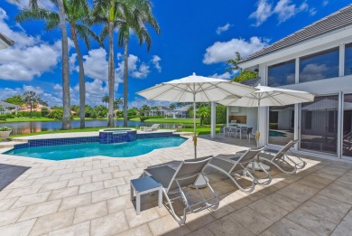 Beautifully renovated custom two story 5 bedroom estate situated on St. Andrews Country Club of Boca Raton in Florida - for sale on GolfHomes.com, golf home, golf lot