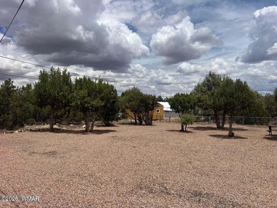 Beautiful well cared for home in White Mountain Lakes. Home come on Silver Creek Golf Club in Arizona - for sale on GolfHomes.com, golf home, golf lot