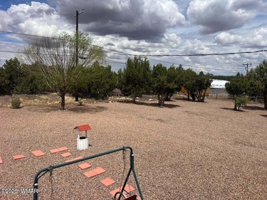 Beautiful well cared for home in White Mountain Lakes. Home come on Silver Creek Golf Club in Arizona - for sale on GolfHomes.com, golf home, golf lot