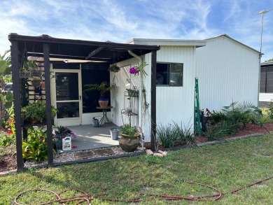 This 2-bedroom, 1-bathroom gem offers an incredible value and is on Crystal Lake Club in Florida - for sale on GolfHomes.com, golf home, golf lot