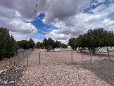Beautiful well cared for home in White Mountain Lakes. Home come on Silver Creek Golf Club in Arizona - for sale on GolfHomes.com, golf home, golf lot