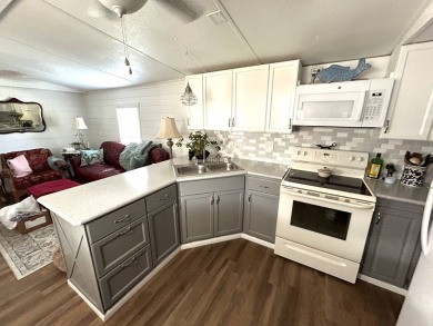 This 2-bedroom, 1-bathroom gem offers an incredible value and is on Crystal Lake Club in Florida - for sale on GolfHomes.com, golf home, golf lot
