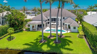 Beautifully renovated custom two story 5 bedroom estate situated on St. Andrews Country Club of Boca Raton in Florida - for sale on GolfHomes.com, golf home, golf lot