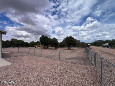 Beautiful well cared for home in White Mountain Lakes. Home come on Silver Creek Golf Club in Arizona - for sale on GolfHomes.com, golf home, golf lot