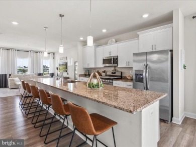 Welcome to 35210 Wright Way - a beautifully maintained end-unit on Plantation Lakes Golf and Country Club in Delaware - for sale on GolfHomes.com, golf home, golf lot