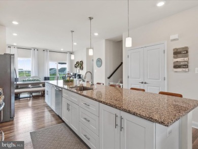 Welcome to 35210 Wright Way - a beautifully maintained end-unit on Plantation Lakes Golf and Country Club in Delaware - for sale on GolfHomes.com, golf home, golf lot