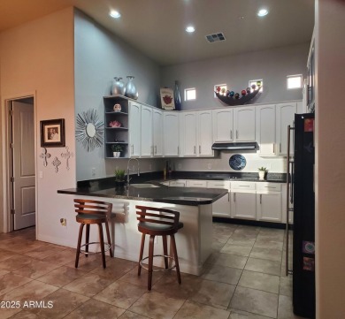 STUNNING GOLF COURSE HOME IN THE GATED COMMUNITY OF THE on Wigwam Golf  Resort Litchfield Park  in Arizona - for sale on GolfHomes.com, golf home, golf lot