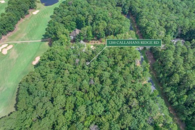 Located on the 6th fairway of the renowned National Golf Course on Reynolds Lake Oconee - The Oconee in Georgia - for sale on GolfHomes.com, golf home, golf lot