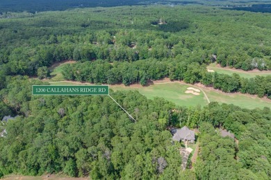Located on the 6th fairway of the renowned National Golf Course on Reynolds Lake Oconee - The Oconee in Georgia - for sale on GolfHomes.com, golf home, golf lot
