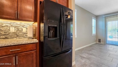 Hard to find 3 bedroom, 2.5 bathroom home located in the vibrant on Verrado Golf Club - Victory in Arizona - for sale on GolfHomes.com, golf home, golf lot