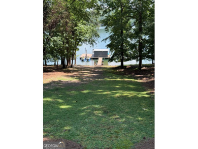 Listed below current appraisal. This isn't just a house on the on Lanier Island Legacy Golf Couorse in Georgia - for sale on GolfHomes.com, golf home, golf lot