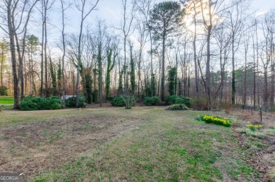 YOU NEED TO CHECK OUT this rare ranch on a full, finished on Collins Hill Golf Club in Georgia - for sale on GolfHomes.com, golf home, golf lot