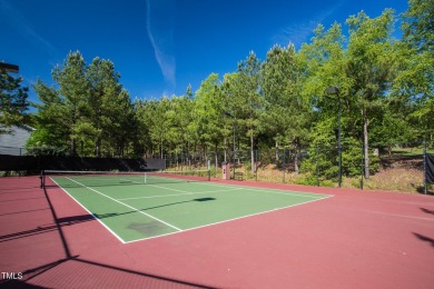 Quiet cul de sac home walking distance to grocery, shops, and on Heritage Golf Club in North Carolina - for sale on GolfHomes.com, golf home, golf lot
