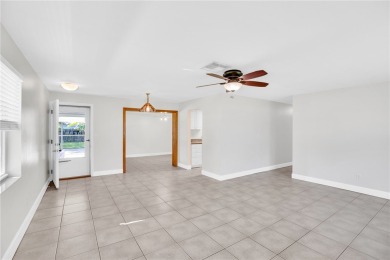 Charming 2-bed, 1-bath home on nearly half an acre (.45+/-) in on Sandridge Golf Course and Club in Florida - for sale on GolfHomes.com, golf home, golf lot