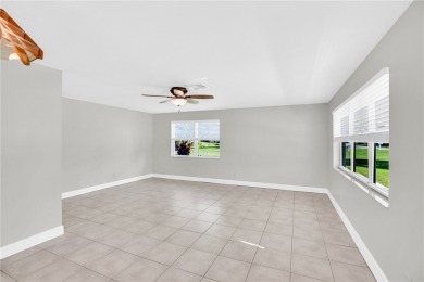 Charming 2-bed, 1-bath home on nearly half an acre (.45+/-) in on Sandridge Golf Course and Club in Florida - for sale on GolfHomes.com, golf home, golf lot