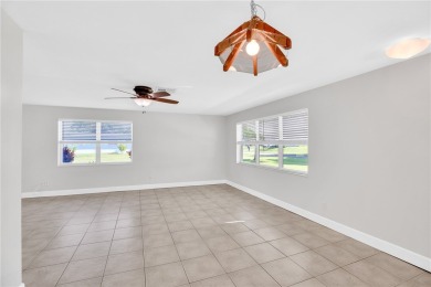 Charming 2-bed, 1-bath home on nearly half an acre (.45+/-) in on Sandridge Golf Course and Club in Florida - for sale on GolfHomes.com, golf home, golf lot