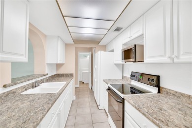 Charming 2-bed, 1-bath home on nearly half an acre (.45+/-) in on Sandridge Golf Course and Club in Florida - for sale on GolfHomes.com, golf home, golf lot