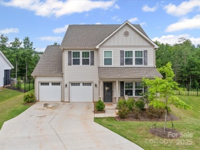 Nestled on a serene cul-de-sac lot with a picturesque pond view on Edgewater Golf Club in South Carolina - for sale on GolfHomes.com, golf home, golf lot