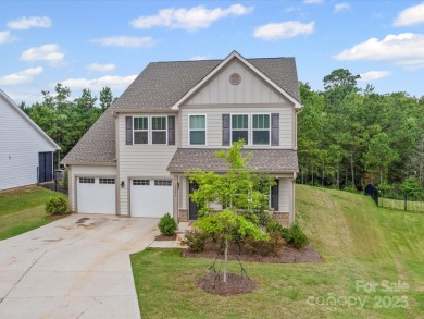 Nestled on a serene cul-de-sac lot with a picturesque pond view on Edgewater Golf Club in South Carolina - for sale on GolfHomes.com, golf home, golf lot