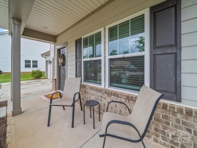 Nestled on a serene cul-de-sac lot with a picturesque pond view on Edgewater Golf Club in South Carolina - for sale on GolfHomes.com, golf home, golf lot