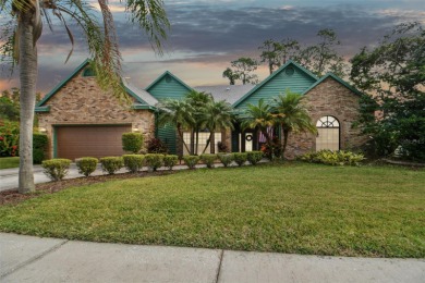 Situated on a large corner lot with mature, flowering bushes and on Bloomingdale Golfers Club in Florida - for sale on GolfHomes.com, golf home, golf lot