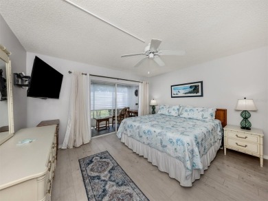 Light and bright ground floor two-bedroom, two-bath home enjoys on Plantation Golf and Country Club in Florida - for sale on GolfHomes.com, golf home, golf lot