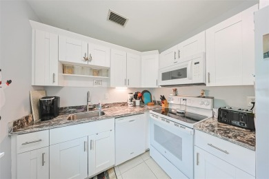 Welcome home to this lovely 2 bedroom/2 bath Condo in Kings on Kings Point Executive Golf Course in Florida - for sale on GolfHomes.com, golf home, golf lot