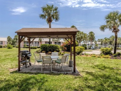 Light and bright ground floor two-bedroom, two-bath home enjoys on Plantation Golf and Country Club in Florida - for sale on GolfHomes.com, golf home, golf lot