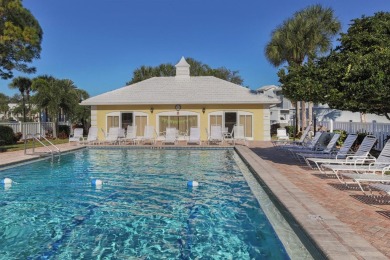 Light and bright ground floor two-bedroom, two-bath home enjoys on Plantation Golf and Country Club in Florida - for sale on GolfHomes.com, golf home, golf lot
