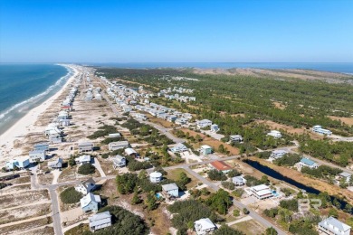 Beautiful beach home on this extra large corner lot of Surfside on Kiva Dunes Golf Club in Alabama - for sale on GolfHomes.com, golf home, golf lot