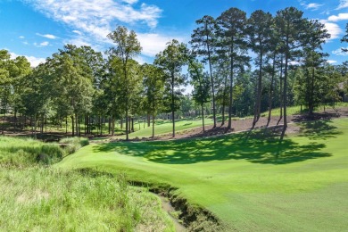 Upscale custom home located in Angel Pond. This home offers on Reynolds Lake Oconee - The Oconee in Georgia - for sale on GolfHomes.com, golf home, golf lot